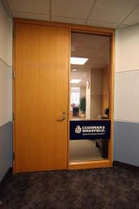 Cushman and Wakefield Door Sign