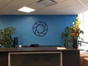 Trinet X Reception Sign Logo